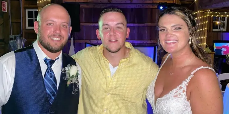Bride, groom and family portrait