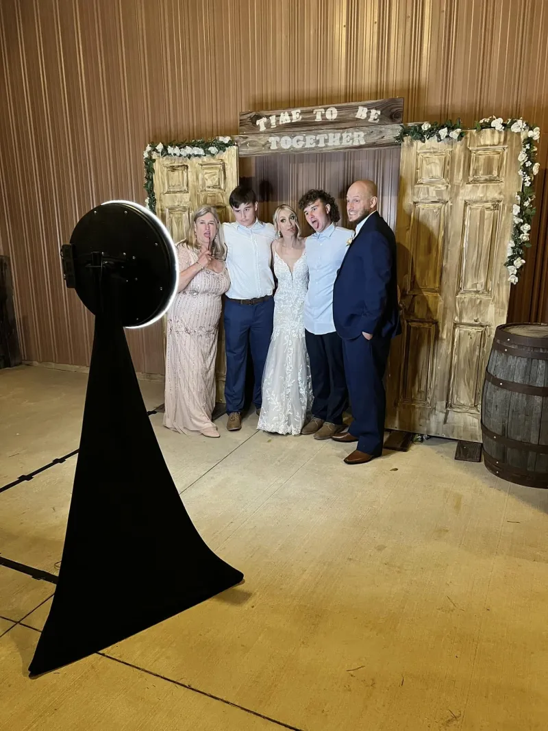 DJ booth, lighting and photo booth set up together