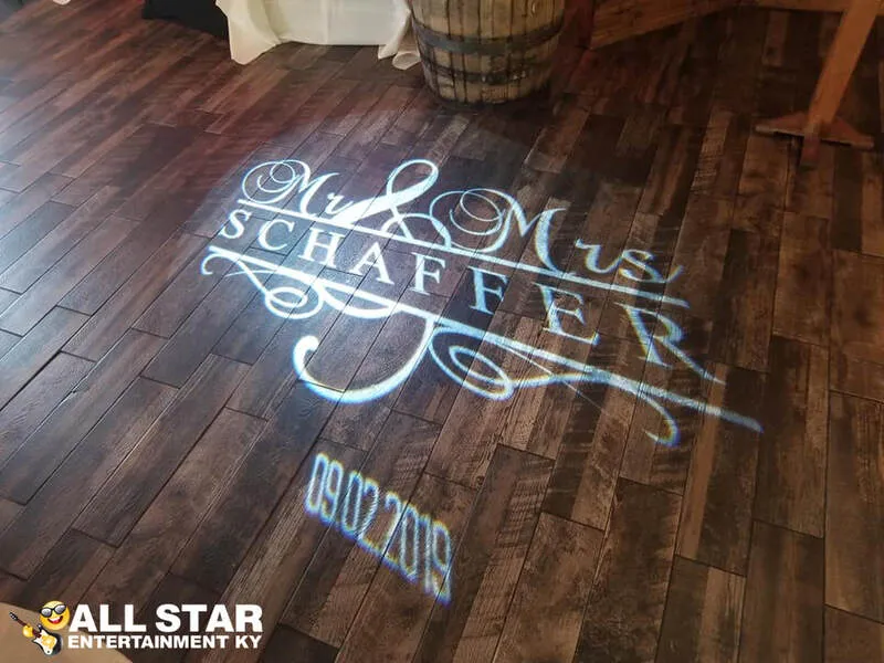 Personalized monogram light projected at a reception